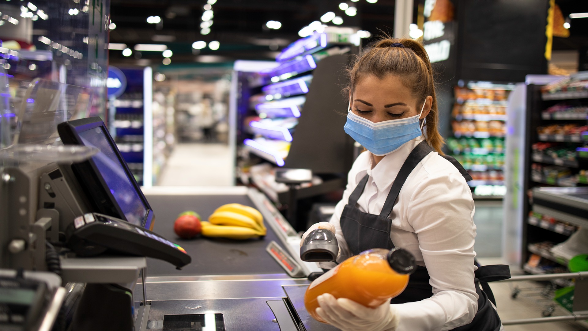 cashier-supermarket-wearing-mask-gloves-fully-protected-against-corona-virus